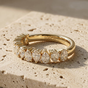 LUMINA CASCADE, PEAR-CUT MOISSANITE HALF-ETERNITY BAND