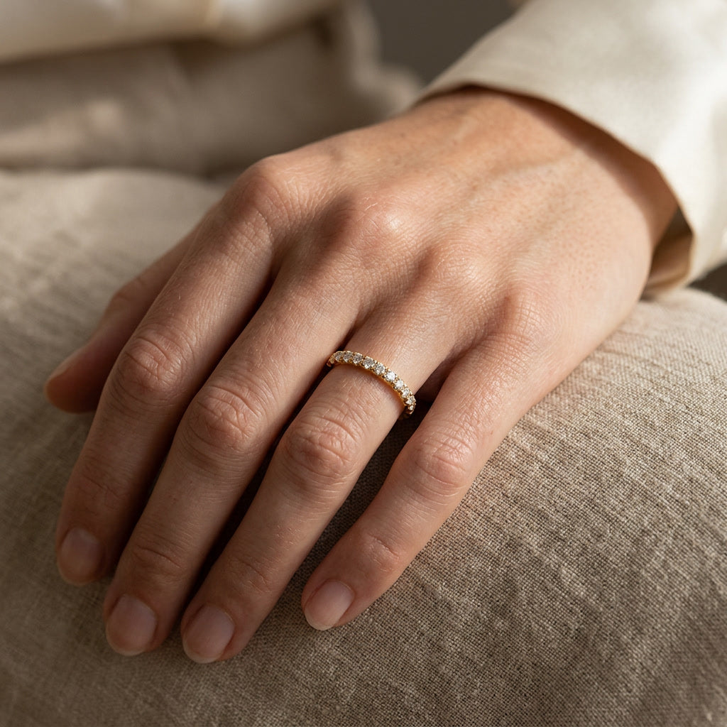 LUMINA RIVIÈRE moissanite eternity band on hand | Heritage & Co.