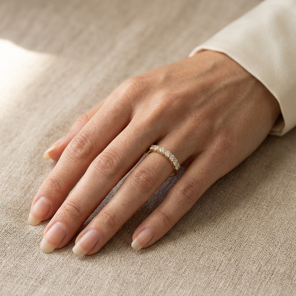 LUMINA PLÉIADE seven-stone moissanite band on hand | Heritage & Co.