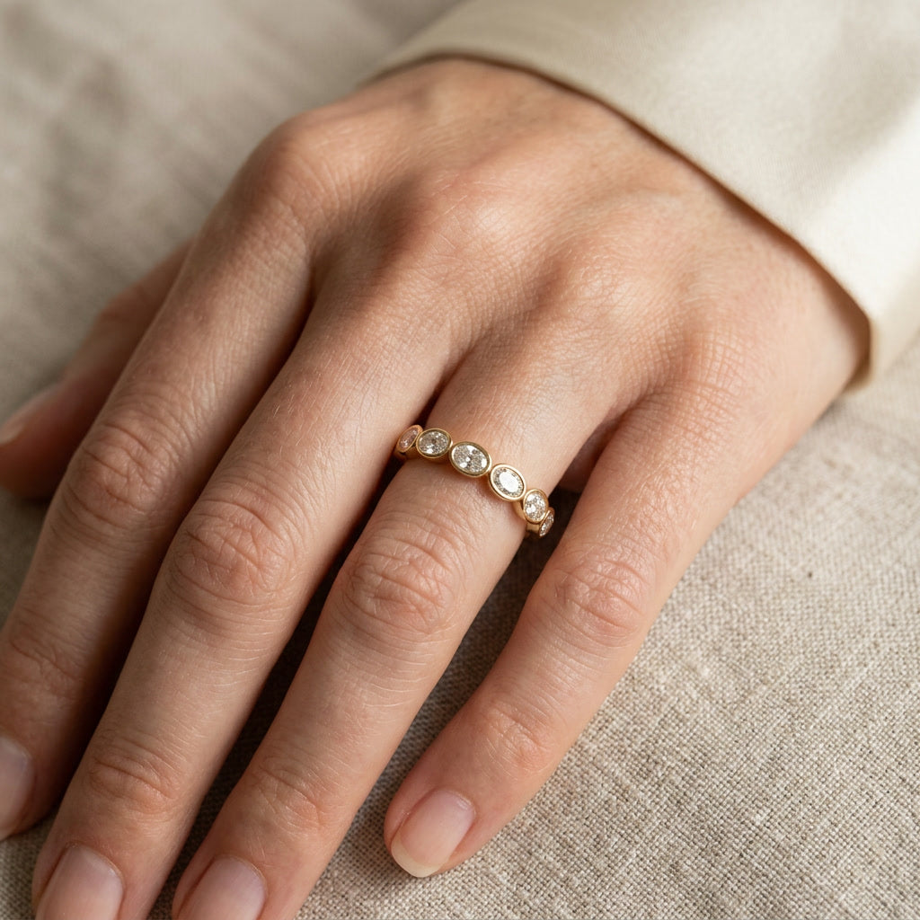 LUMINA MÉRIDIENNE east-west oval lab diamond band on hand | Heritage & Co.
