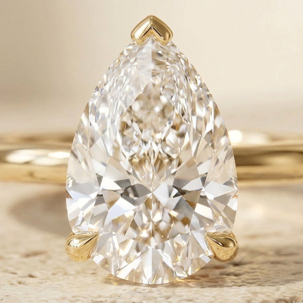 AETERNA ROSÉE pear moissanite ring — macro stone detail