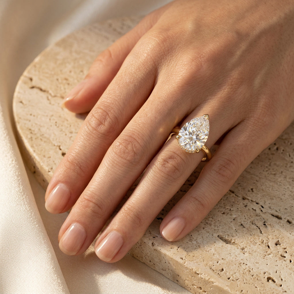 AETERNA ROSÉE pear moissanite ring — on hand