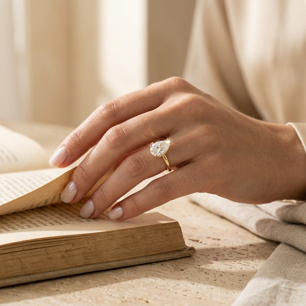 AETERNA ROSÉE pear moissanite ring — lifestyle
