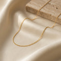 CATENELLA fine cable chain necklace, solid gold — editorial