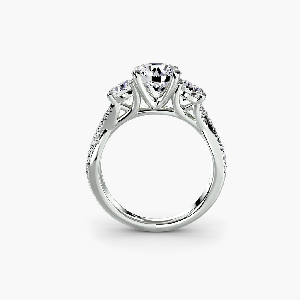 Three-Stone With Round Side Stones And Crossover Pavé Shank, front view