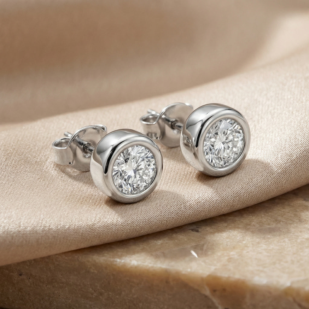 NOVELLA ALBA POINT, 2-DIAMOND STUD EARRINGS | Heritage & Co.
