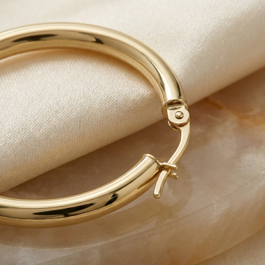 PURUS ANNEAU, POLISHED GOLD HOOP EARRINGS | Heritage & Co.