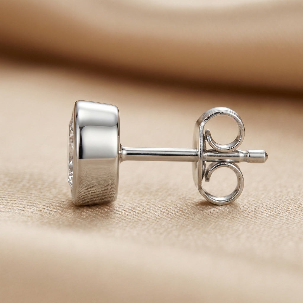 NOVELLA ALBA POINT, 2-DIAMOND STUD EARRINGS | Heritage & Co.