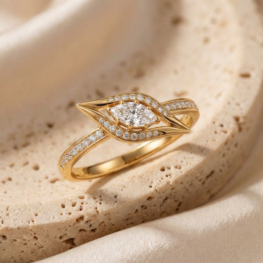 UMSEBE, EAST-WEST MARQUISE LAB DIAMOND RING
