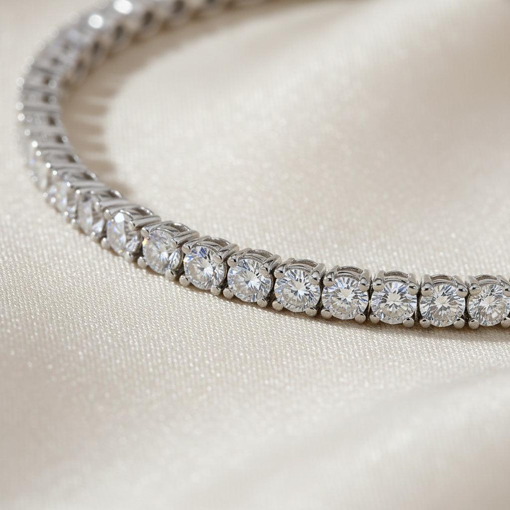 Macro detail of the continuous lab diamond line and 18K white gold claw settings