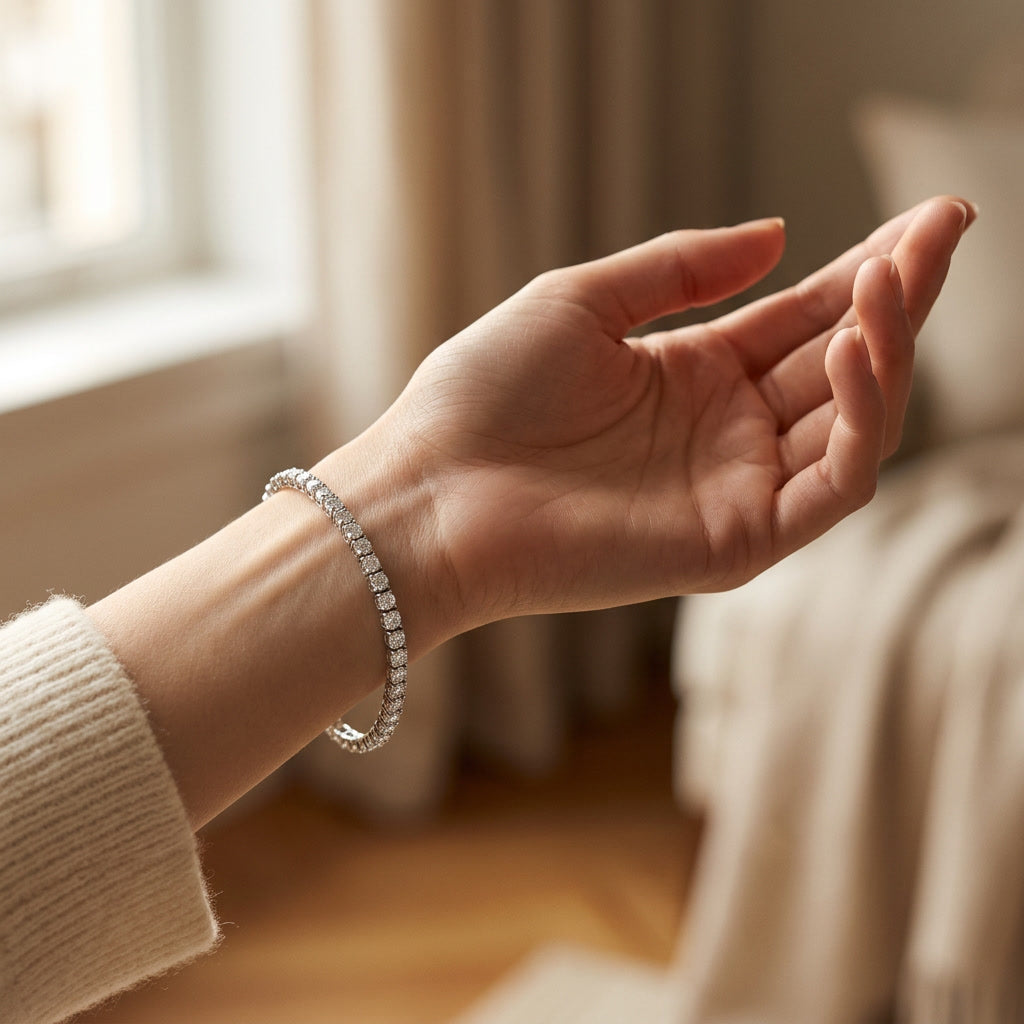 LUMINA ALBA RIVIÈRE bracelet on the wrist, showing the articulated line and drape