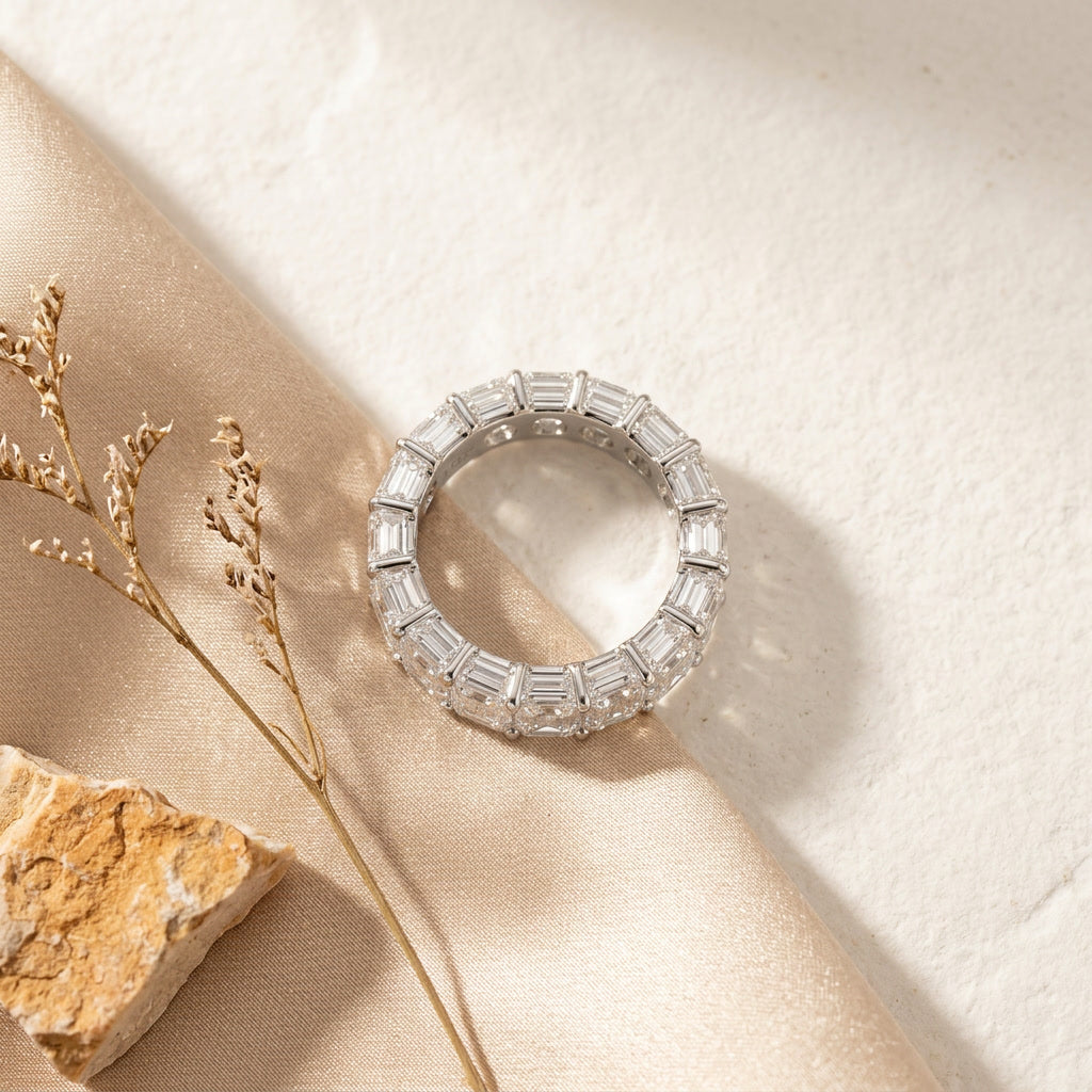 LUMINA BARREAU baguette moissanite eternity band — editorial still life