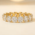 LUMINA GRANDEUR round moissanite eternity band, yellow gold — front view