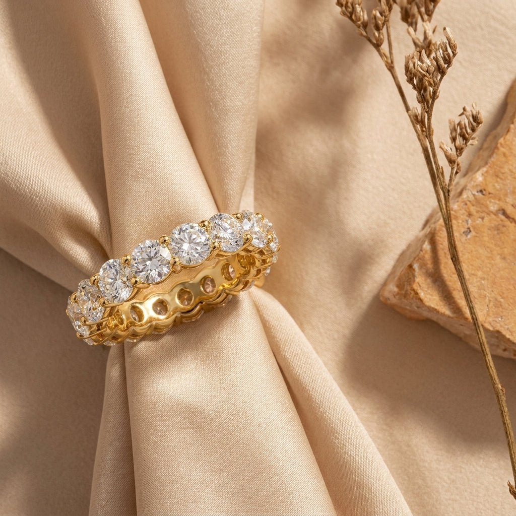 LUMINA GRANDEUR round moissanite eternity band — editorial still life