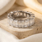 LUMINA MAJEUR baguette moissanite eternity band — three-quarter angle