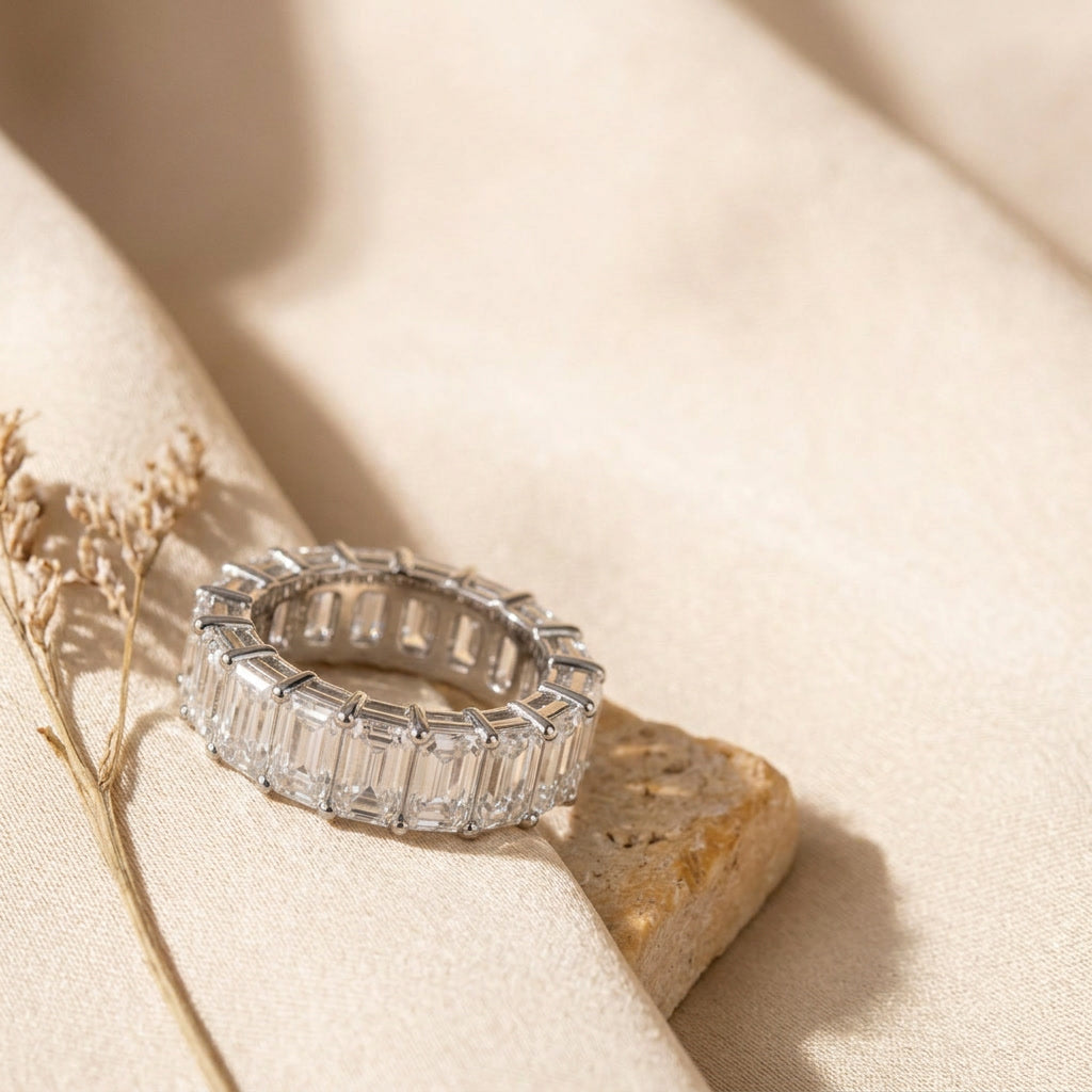 LUMINA MAJEUR baguette moissanite eternity band — editorial still life