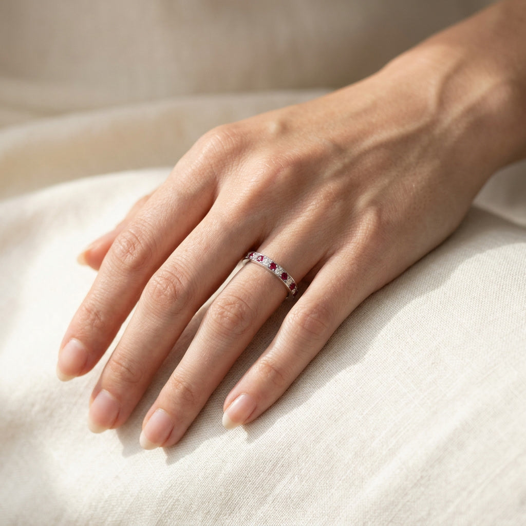 LUMINA RUBIS ÉTERNITÉ ruby and diamond eternity band worn on hand