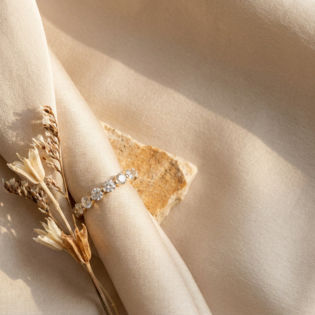 LUMINA SCINTILLE moissanite eternity band, editorial flat lay