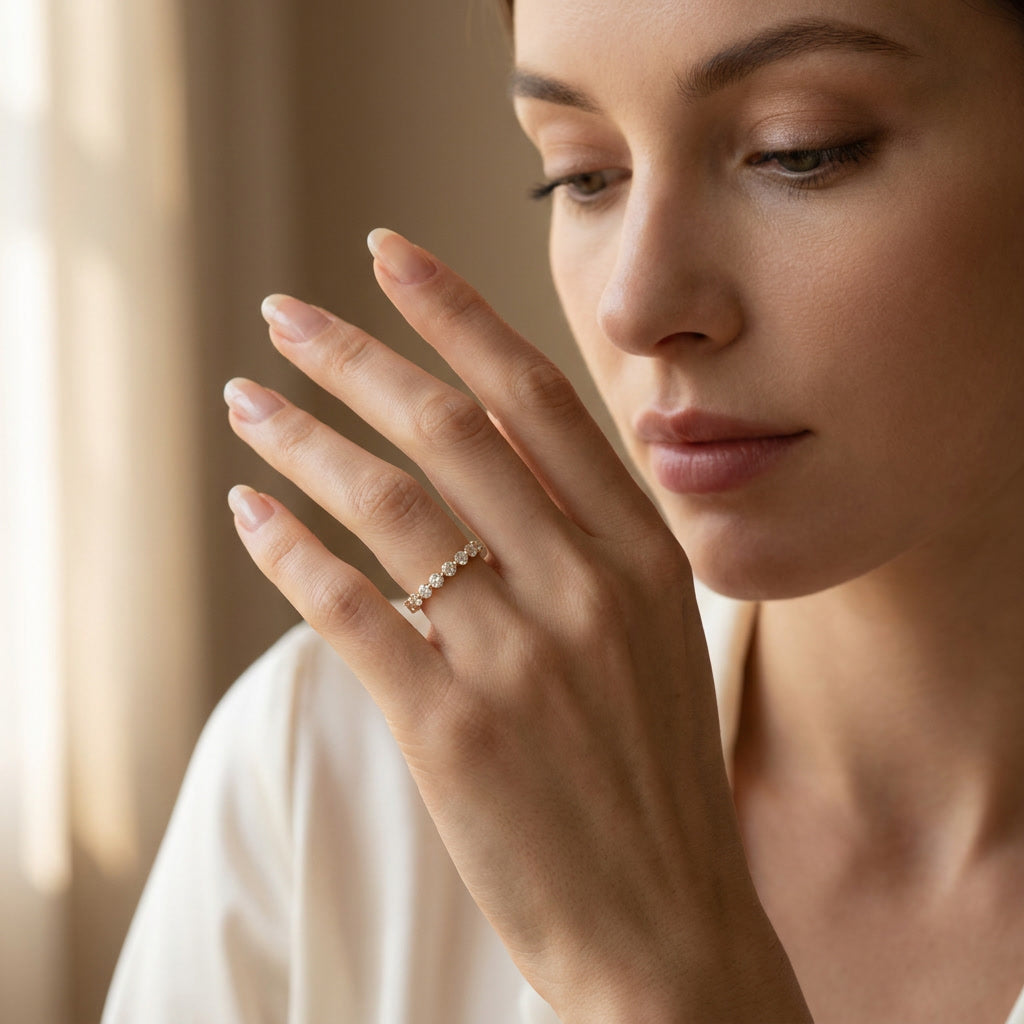 Model wearing the LUMINA SCINTILLE moissanite eternity band